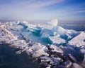 Blue and cold ice of Lake Baikal. Hummocks