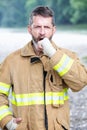 Blue Collar man in work wear yawning Royalty Free Stock Photo