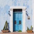 Blue colonial facade with cactus, Campeche, Mexico