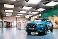 Blue color compact crossover SUV Car Nissan Qashqai In Hall Of Shopping Center. SUV produced by the Japanese car Royalty Free Stock Photo