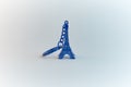 Blue color Eiffel tower souvenir keychain. Royalty Free Stock Photo