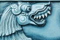 Blue color india temple relief art closeup view