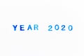 Blue ink of rubber stamp in word year 2020 on white paper background Royalty Free Stock Photo