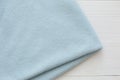 Blue color knitted fabric on white background