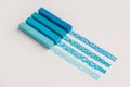 Blue color pastel crayon chalks over its own trace line Royalty Free Stock Photo