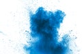 Blue color powder explosion cloud on white background.Closeup of Blue dust particles splash on background Royalty Free Stock Photo