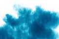 Blue color powder explosion cloud on white background.Closeup of Blue dust particles splash on background Royalty Free Stock Photo