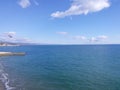 Blue color of the sea with breakwater and seagull