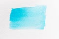 Blue watercolor handdrawing as line brush on white paper background