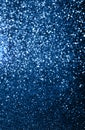 Blue colored blured sparkling background with focused area. Royalty Free Stock Photo