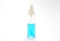 Blue colored cleansing alcohol in dispensor. Royalty Free Stock Photo