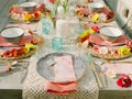 A place setting for a dinner guest at a colorfully decorated table