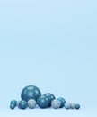Spheres and toys on blue background, 3d render Royalty Free Stock Photo