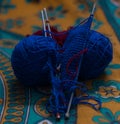 blue colored wollen ball used for knitting in winter season