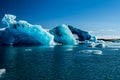 Blue coloured icebergs in glacier lagoon