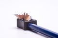 Blue coloured pencil sharpened using a sharpener Royalty Free Stock Photo