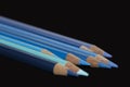 8 Blue Coloured Pencils - Black Background Royalty Free Stock Photo