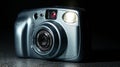 Blue Compact Camera Close-Up With Lens, Flash, and Vintage Design on Dark Surface Royalty Free Stock Photo