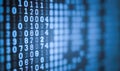 Blue computer screen filled with binary code. Ideal for concepts related to data, technology, and cybersecurity. Abstract Royalty Free Stock Photo