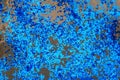 Blue confetti on asphalt after a holiday, party, carnival. Decorations for a birthday party or invitation. Confetti floor. Festive