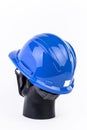The blue Construction Helmet to protect and safe life in the contraction area for constructor, engineer and worker Royalty Free Stock Photo
