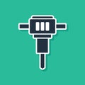 Blue Construction jackhammer icon isolated on green background. Vector