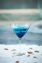 Blue cool refreshing summer cocktail drink with ice in glass Royalty Free Stock Photo