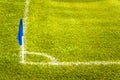 Blue Corner Flag on a Football Field with Green Turf Grass Royalty Free Stock Photo