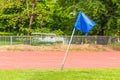 Blue corner flag on an soccer field Royalty Free Stock Photo