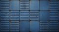 Blue corrugated metal wall composed of rectangular panels arranged in a grid pattern Royalty Free Stock Photo