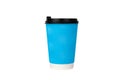 Blue corrugated paper disposable cup for cappuccino or latte isolated on white background. Coffee to go. Close-up Royalty Free Stock Photo