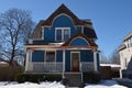 Blue Cottage in Snow