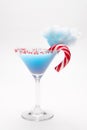 Blue cotton candy cocktail on white background. A holiday drink for celebrating Royalty Free Stock Photo