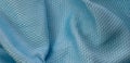 Blue cotton fabric with an interesting pattern Royalty Free Stock Photo