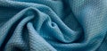 Blue cotton fabric with an interesting pattern Royalty Free Stock Photo