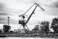 Blue crane in cargo port, colorless Royalty Free Stock Photo