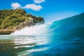 Blue crashing wave in ocean, swell for surfing. Crystal wave in Bali Royalty Free Stock Photo