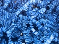 Blue crinkled paper confetti in a box Royalty Free Stock Photo