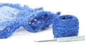 Blue crochet napkin with thread ball isolated Royalty Free Stock Photo