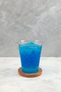 Blue Crushed ice or snow slush with tapioca pearls in disposable plastic cup. Bubble tea. Refreshing summer iced drink. Take away Royalty Free Stock Photo