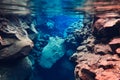 Blue crystal clear glacial water in Silfra Thingvellir national park Iceland