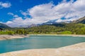 Blue crystal Lake Davos, Davosersee, Graubuenden, Switzerland. Royalty Free Stock Photo