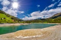 Blue crystal Lake Davos, Davosersee, Graubuenden, Switzerland Royalty Free Stock Photo