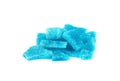 Blue crystal of methamphetamine on white background. Blue ice, bath salt, drug. Blue meth.