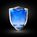 Blue crystal shield in chrome Royalty Free Stock Photo