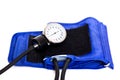 Blue cuff of a tonometer and a manometer on a white background