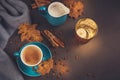 Blue cup of coffee with coffee beans and autumnal dry leaves Royalty Free Stock Photo