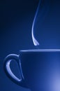 Blue cup with a litte steam Royalty Free Stock Photo