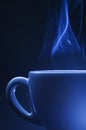 Blue cup with steam Royalty Free Stock Photo