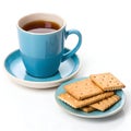 Blue Cup of Tea with Plate of Crackers Isolated on White Background Royalty Free Stock Photo